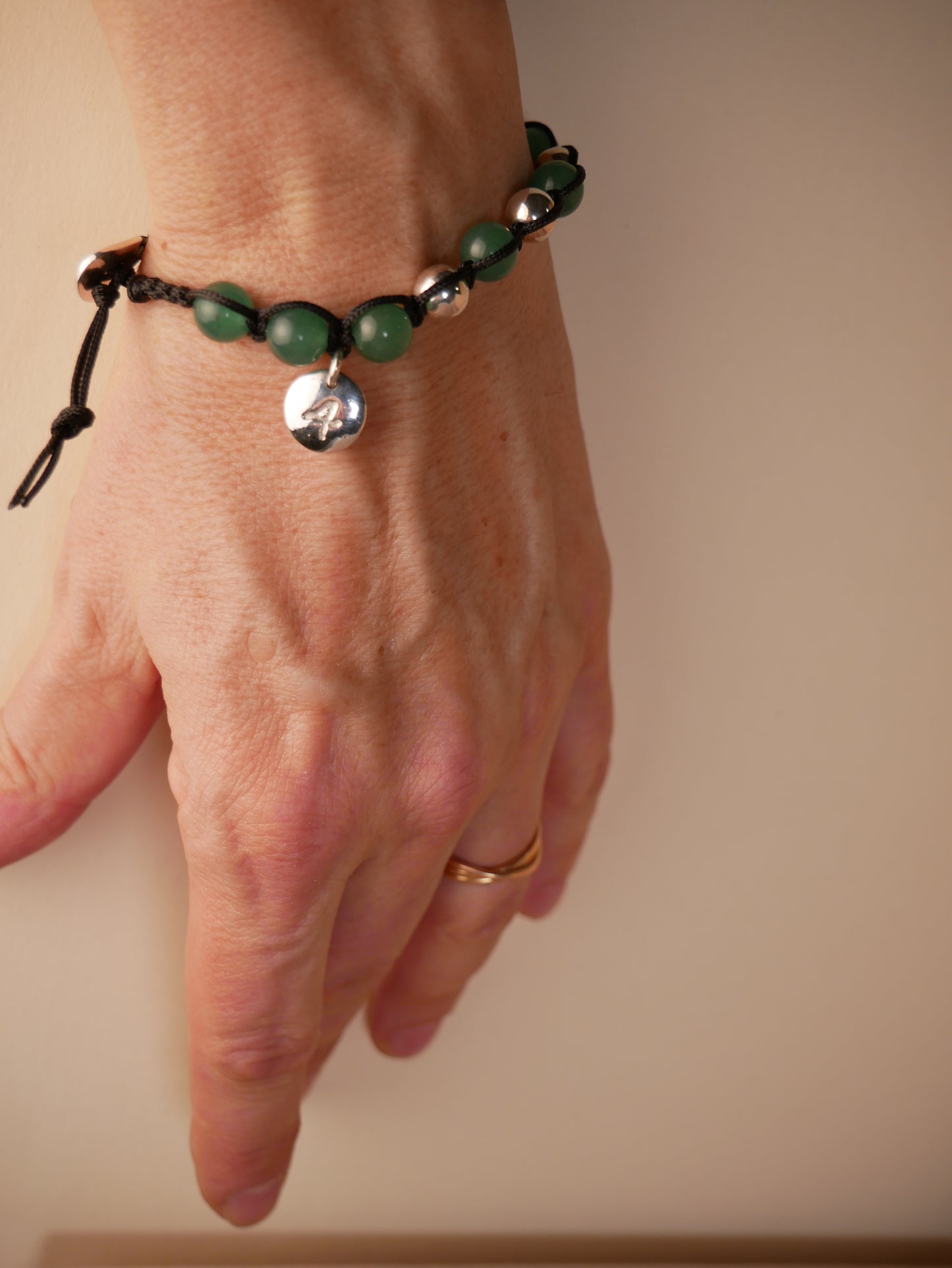 Piastrina in argento rotonda con numero