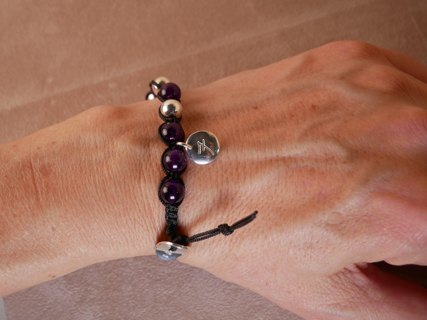 Piastrina in argento rotonda con numero